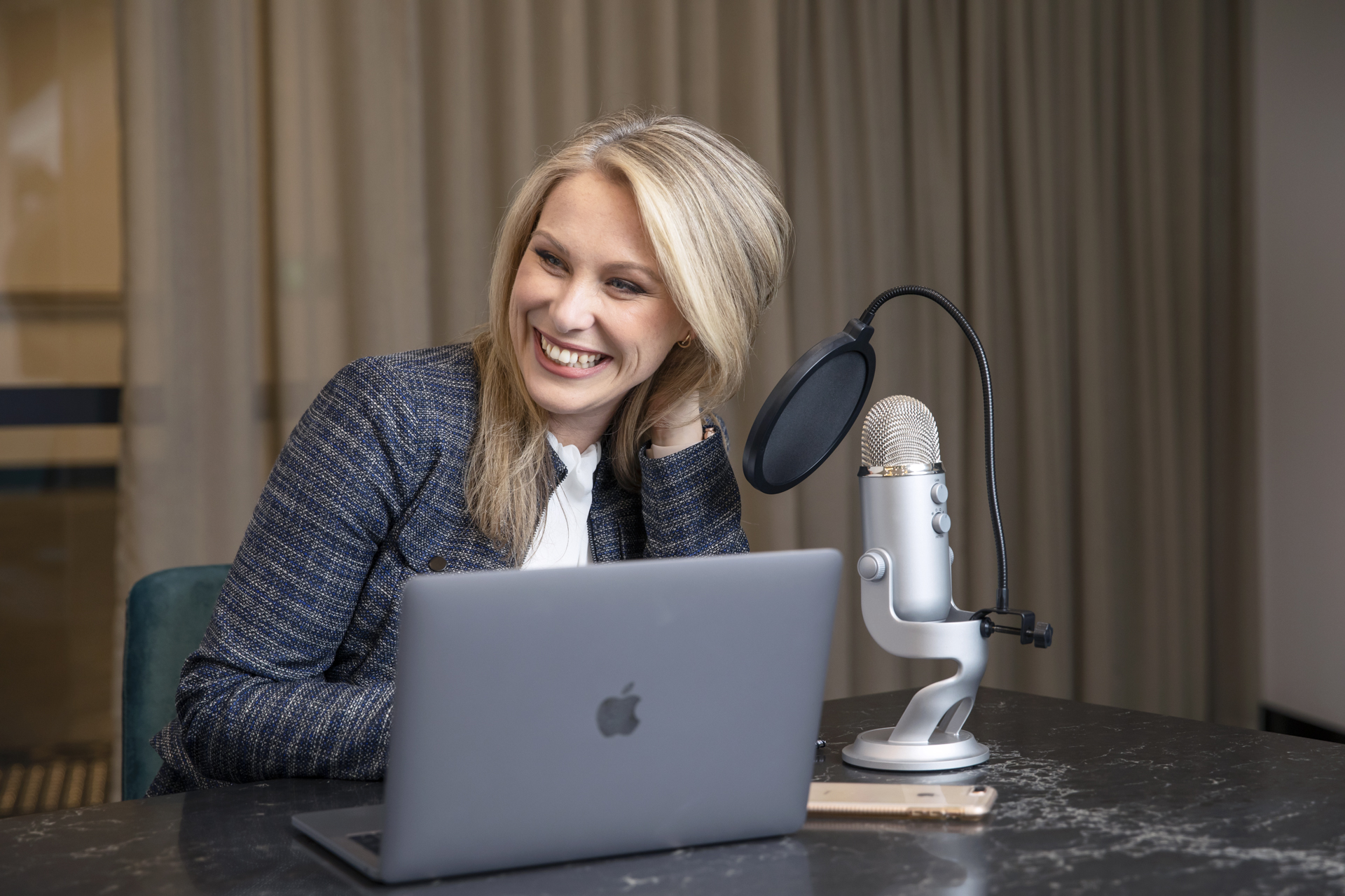 Business woman doing podcast