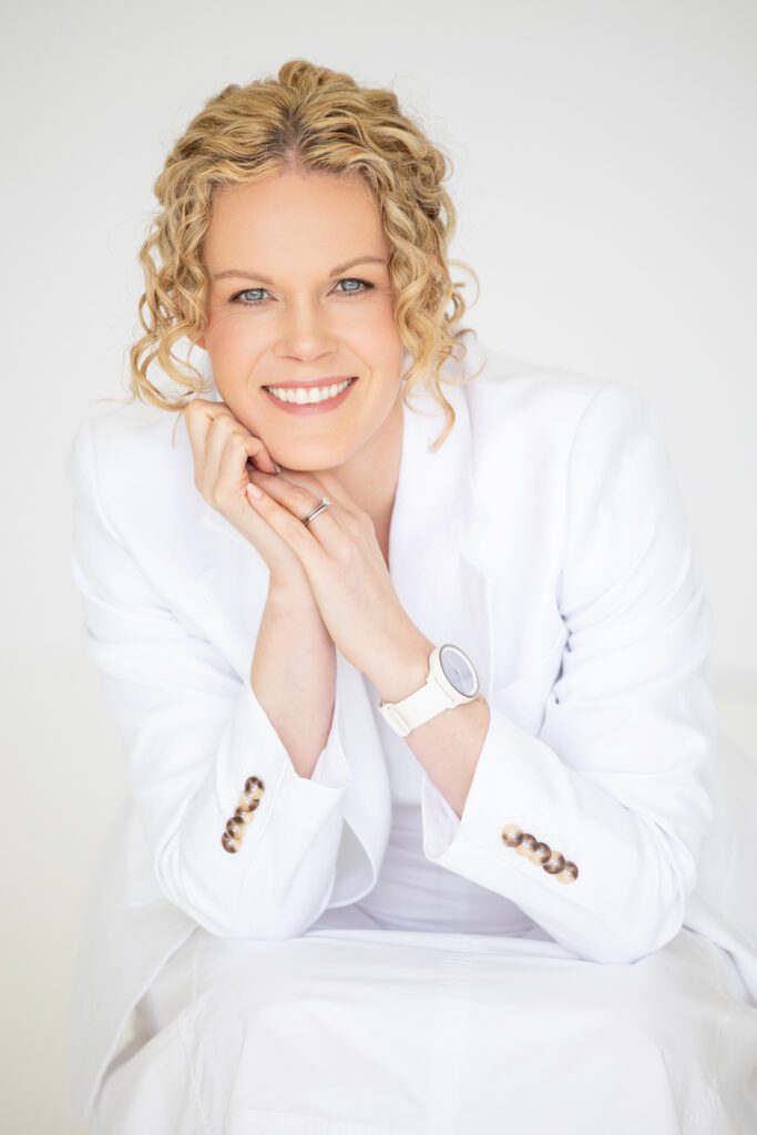 Portrait of a female entrepreneur wearing a white blazer 