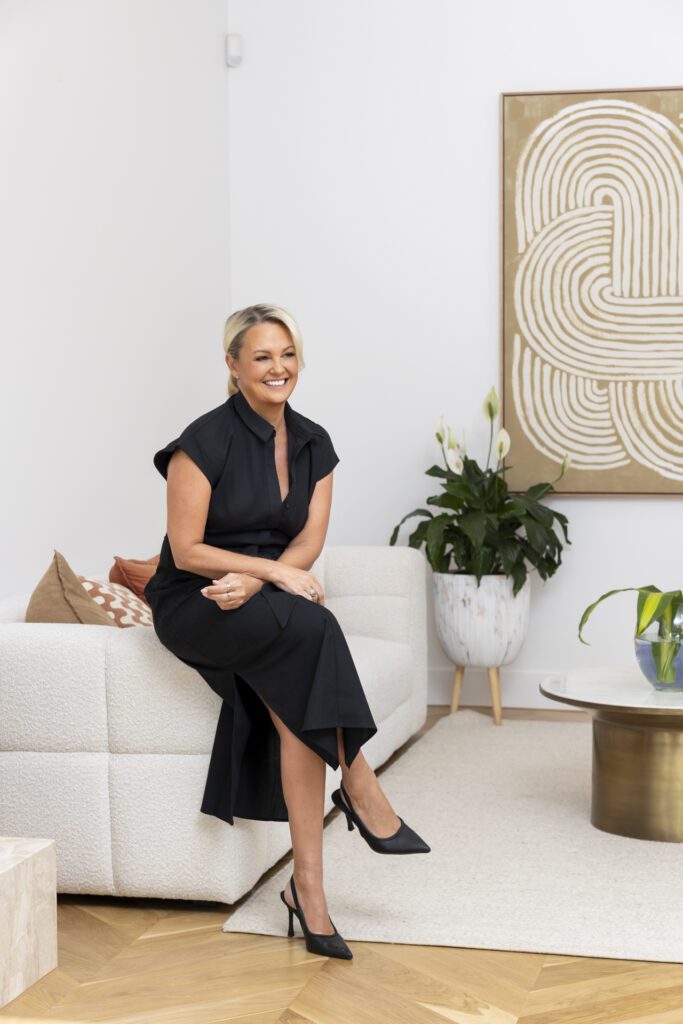 Personal branding photos for real estate agent at styled property