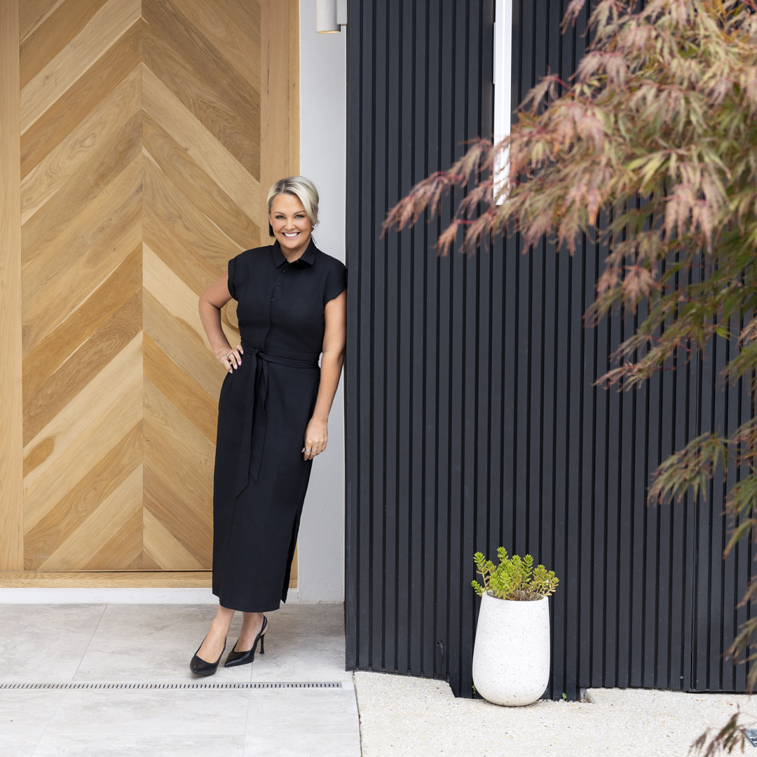 Personal branding photos for real estate agent at styled property